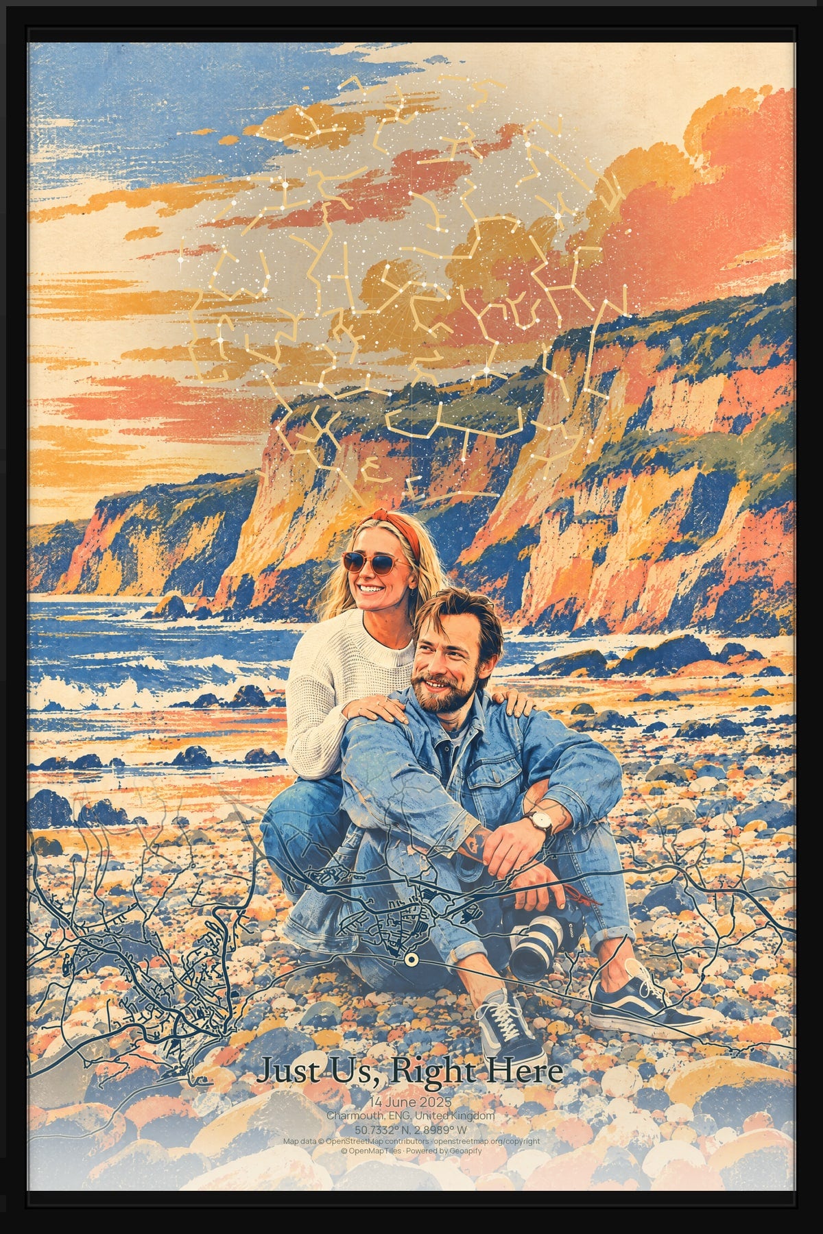 Just Us, Right Here: a seated couple by the coast in Storybook Pop, with their star chart and Charmouth street map, shown in a black frame